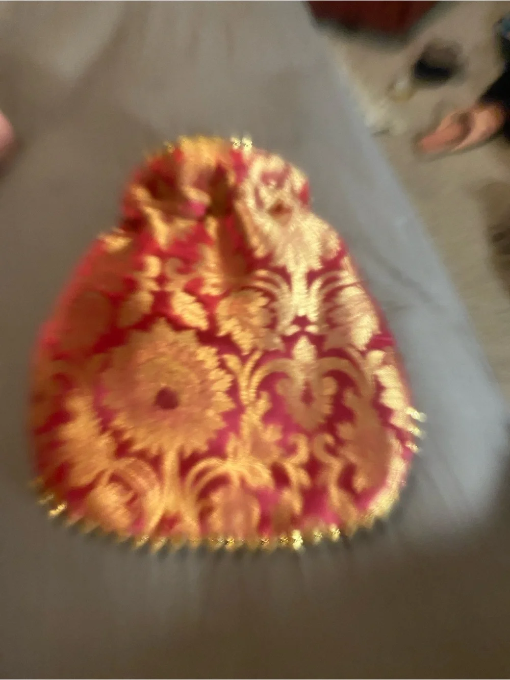 Here are similar traditional Bana silk and brocade potli bag